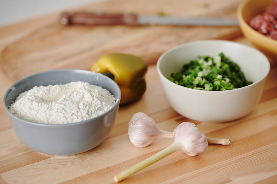 Fresh food preparation in kitchen with vegetables